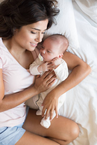 istock Mother with baby 1253920193
