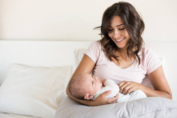 istock Mother with baby 1253920281