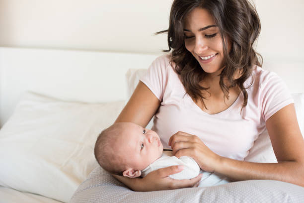 istock Mother with baby 1253920290