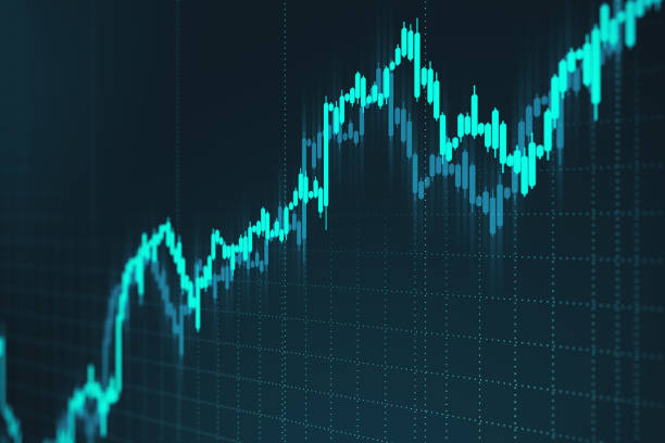 istock Glowing stock charts on virtual screen. 1253920697