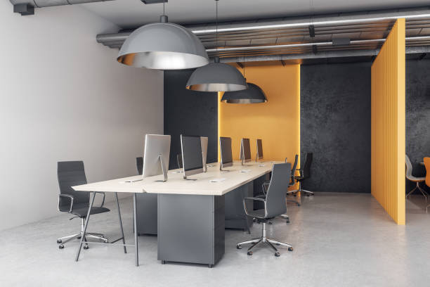 istock Contemporary coworking office interior with computers, 1253921610