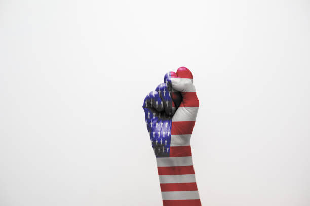 istock American flag and fist 1253923238