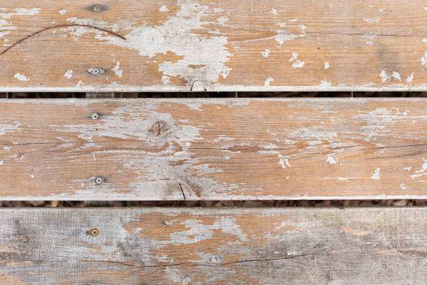istock Vintage old weathered wooden background, toned, selective focus 1253923452