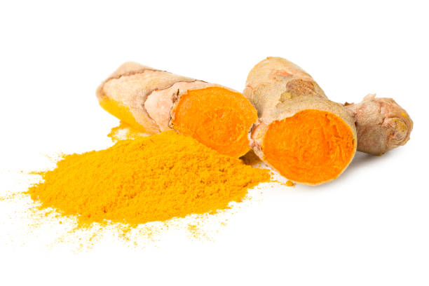 istock Turmeric root with turmeric slices isolated on white background 1253925340