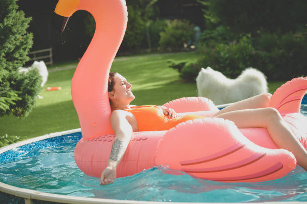 istock young woman swimming in the pool 1253928593