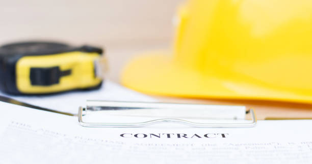 Close-up of a contract for a construction project. Real estate, business Close-up of a contract for a construction project. Real estate, business Contractor’s License.