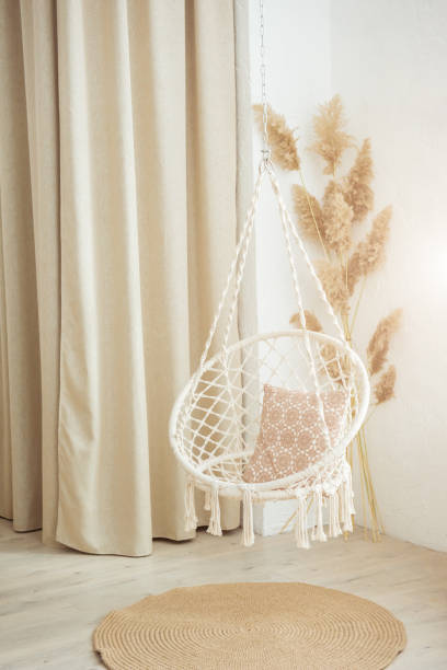istock Stylish modern room interior with swing chair 1253928888