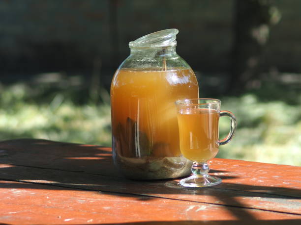 istock Bread kvass in a glass jar, illuminated by the sun 1253929577