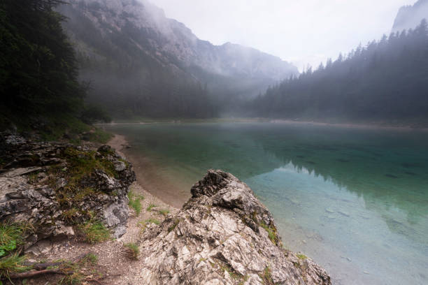 istock Green lake in the Austria Alps 1253930881