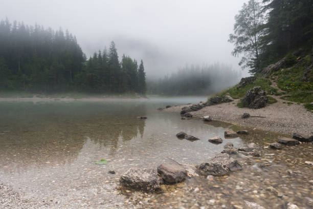 istock Green lake in the Austria Alps 1253930888