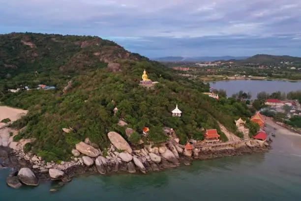 Photo of Buddha statue rests above the mountain in Hua Hin Thailand