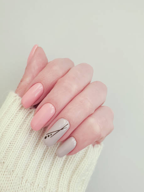 istock hand manicure nail sweater 1253932489
