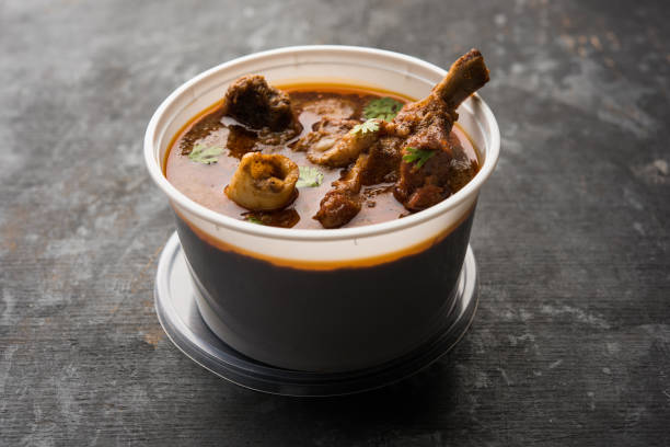 istock Mutton Masala Curry in plastic container for home delivery 1253933861