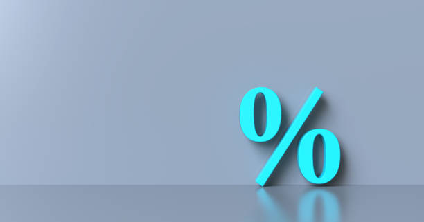 istock Percentage sign on gray wall background, banner, copy space. 1253934132