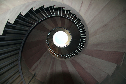 Staircase with a spiral staircase made of stone