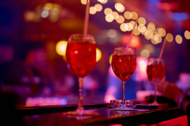istock three red cocktails on the bar in the cafe 1253945795