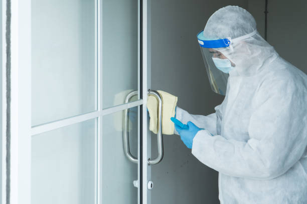 istock Staff is spraying disinfectant and wiping clean 1253950727