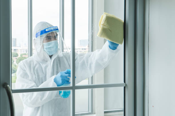 istock Staff is spraying disinfectant and wiping clean 1253950731