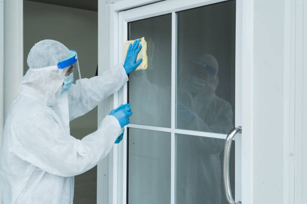 istock Staff is spraying disinfectant and wiping clean 1253950752