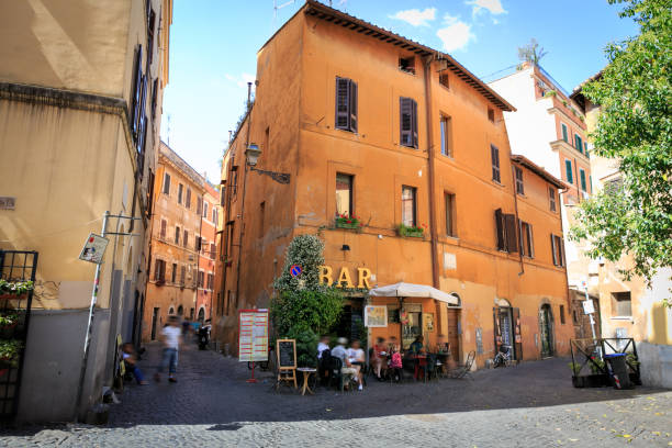 Typical town square with a bar in Rome, Italy Typical town square with a bar in Rome, Italy italian ethnicity stock pictures, royalty-free photos & images