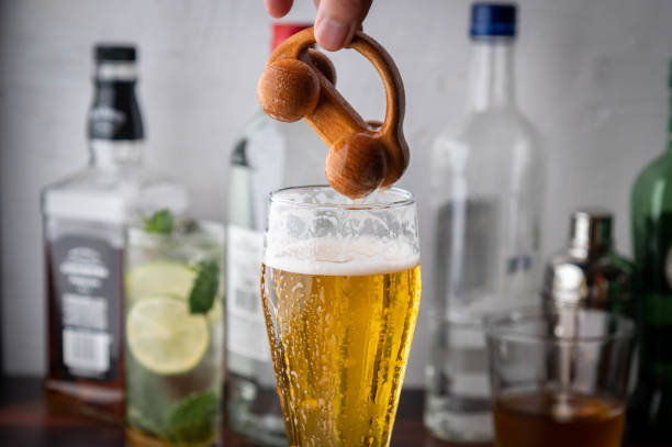 istock toy car sinking into beer, DUI image 1253961189