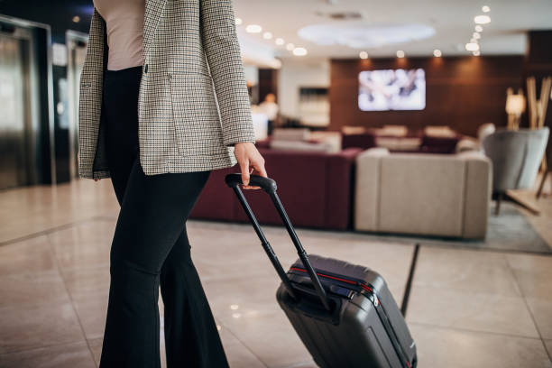 istock Woman arriving in hotel 1253962906
