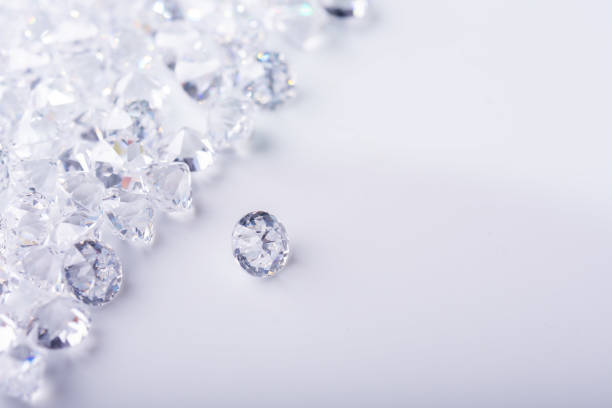 istock Realistic group of diamond on white background with copy space top view 1253968444