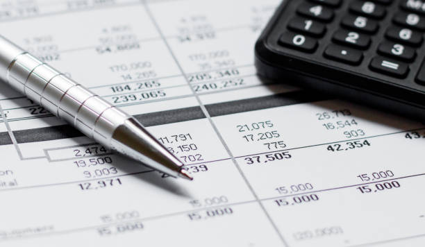 istock Financial accounting stock market graphs analysis 1253978450