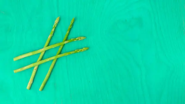 Photo of hashtag made of asparagus, social media post idea