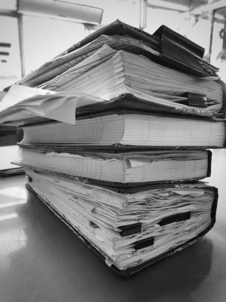 istock Old hard cover book stacked together,dirty and rust from long time used 1253985851