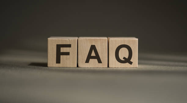 istock Word FAQ made with wood building blocks on a gray background 1253987810