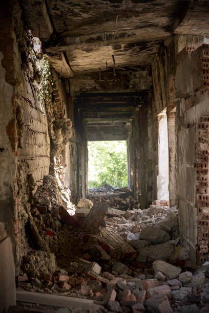istock Demolished building after bombing. Ruin 1253988704