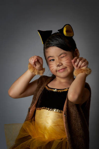 istock Girl in Lion Costume 1253991588