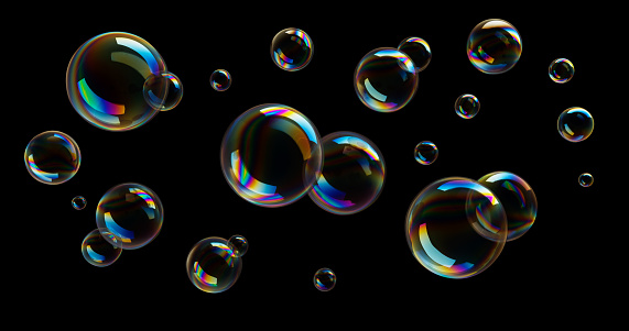 Burbujas de jabón sobre fondo negro photo