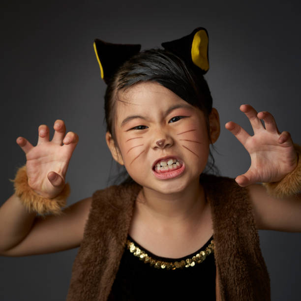istock Girl in Lion Costume 1253992339