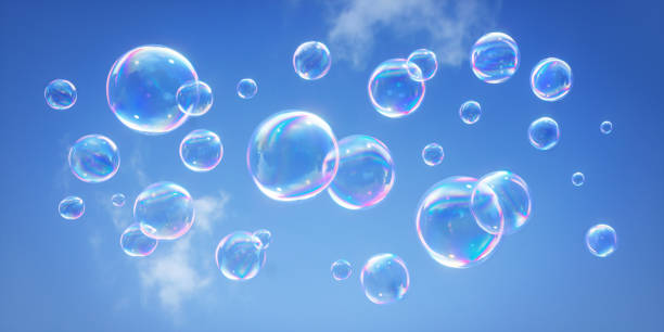 Soap bubbles flying in the blue sky