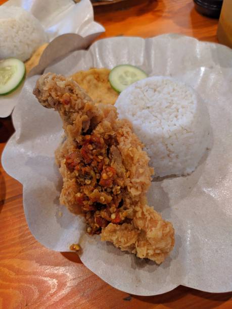 istock Indonesian Popular Cuisine : Spicy Chicken (Ayam Geprek) 1253992733