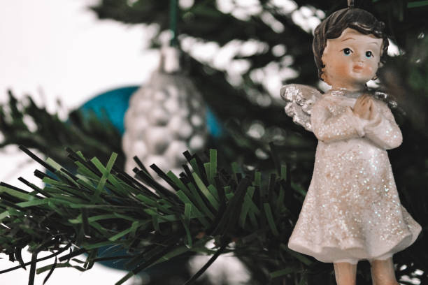 istock Christmas tree toy Christmas white angel on the tree 1253993965