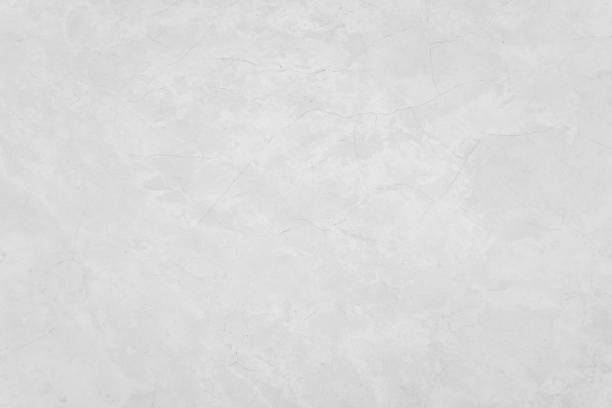 istock White concrete wall for interior or outdoor exposed surface polished. Cement have sand and stone of tone vintage, Grey natural concrete loft patterns old antique, design work floor texture background. 1253995844