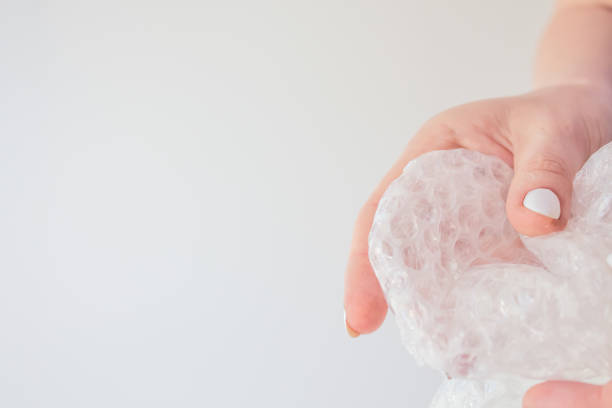 istock Chpok texture, soft film for packaging. White bubble pack packing background. Close up, copy space 1253996012