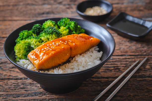 istock Salmon teriyaki with rice and vegetable in bowl 1254000732