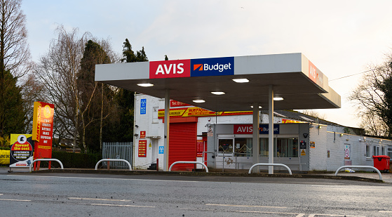 Worcester, United Kingdom - March 15 2020:  The frontage of Avis Budget car rental on Hylton Road