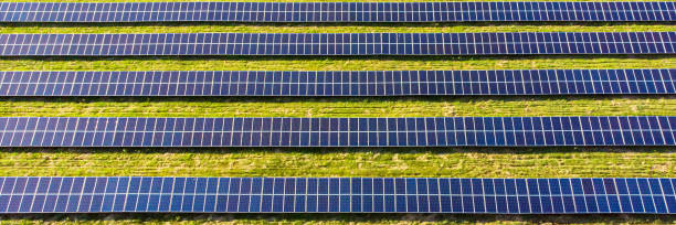 istock Renewable energy poster with solar energy panels 1254007123