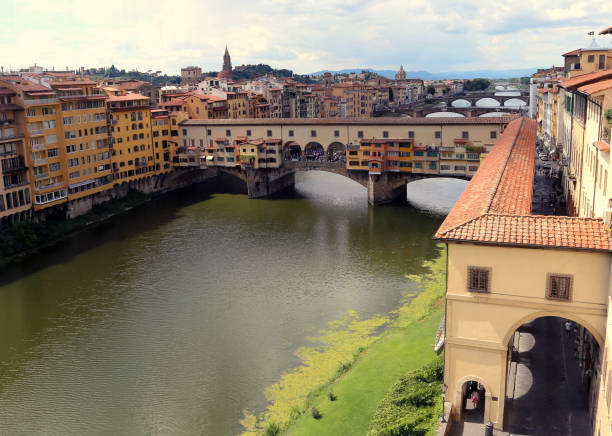 istock Old Bridge called Ponte Vecchio and Vasari Corridor in Florence 1254009451