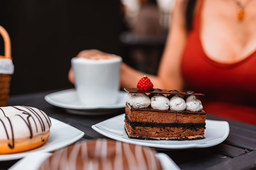 Chocolate cake with strawberry in dish. Dessert concept.