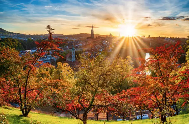 Photo of Amazing autumn scenery of old town of Bern, Switzerland at sunset