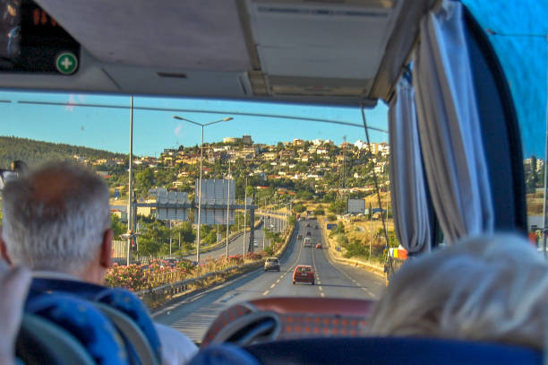 Thessaloniki, Greece, June 01, 2013. Travel through Greece and view of passengers through the front glass of a double deck bus.