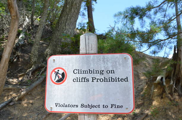 istock climbing on cliffs prohibited sign violators subject to fine 1254012351