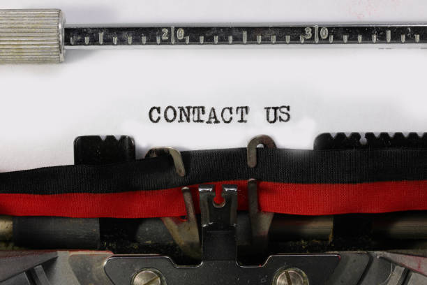 istock text CONTACT US on the old typewriter 1254017753