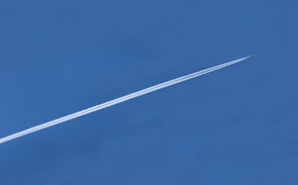 istock white trail of an airplane 1254017969